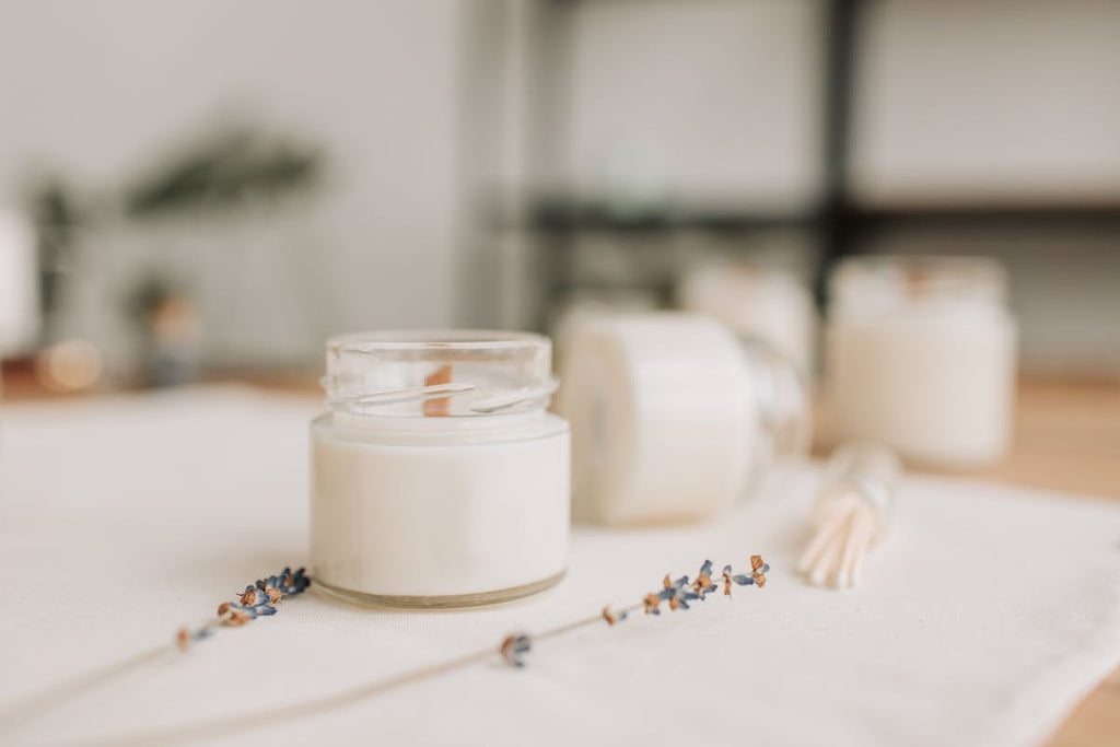 Handcrafted aromatherapy candle with dried lavender flowers
